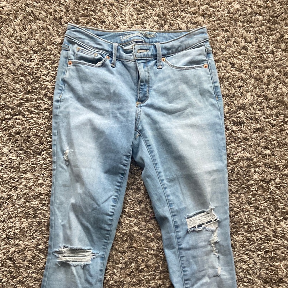 Ripped light wash jeans size 2